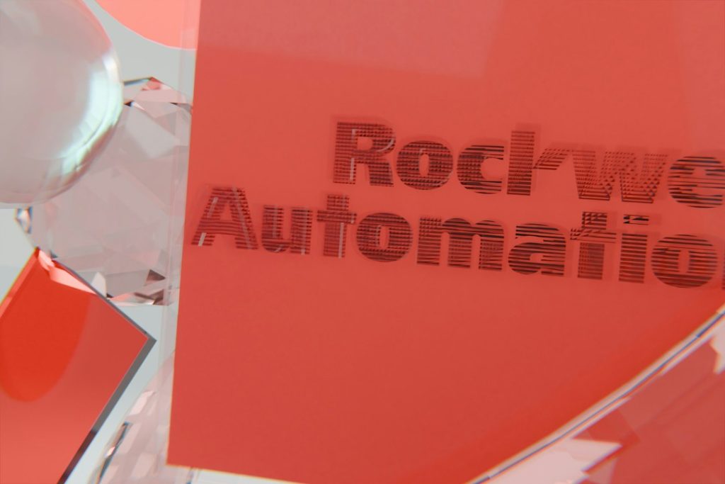 rockwell-automation-text-on-a-red-surface-with-reflective-elements-j89hdnkrdqi